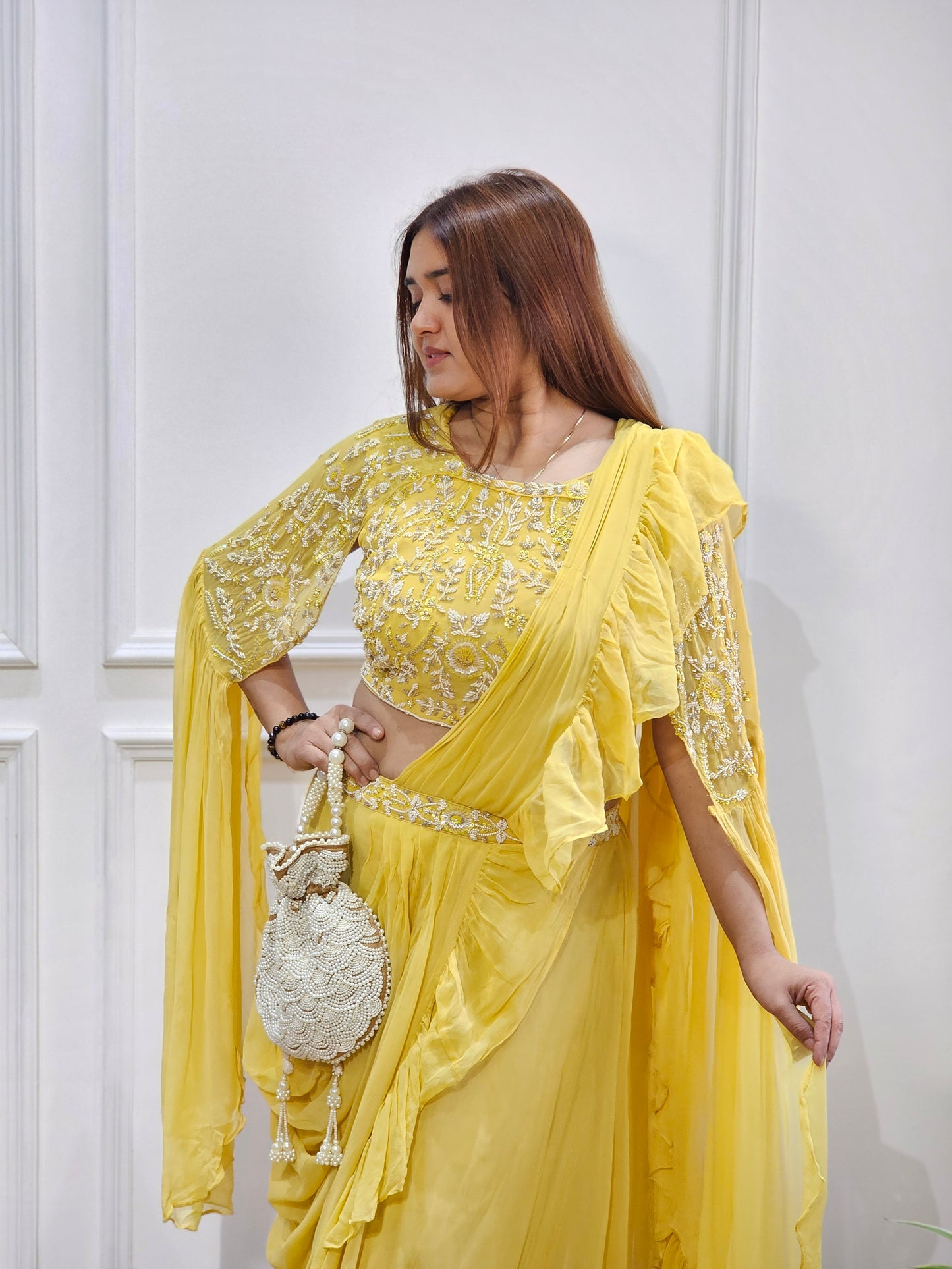 Jeenas yellow drape saree