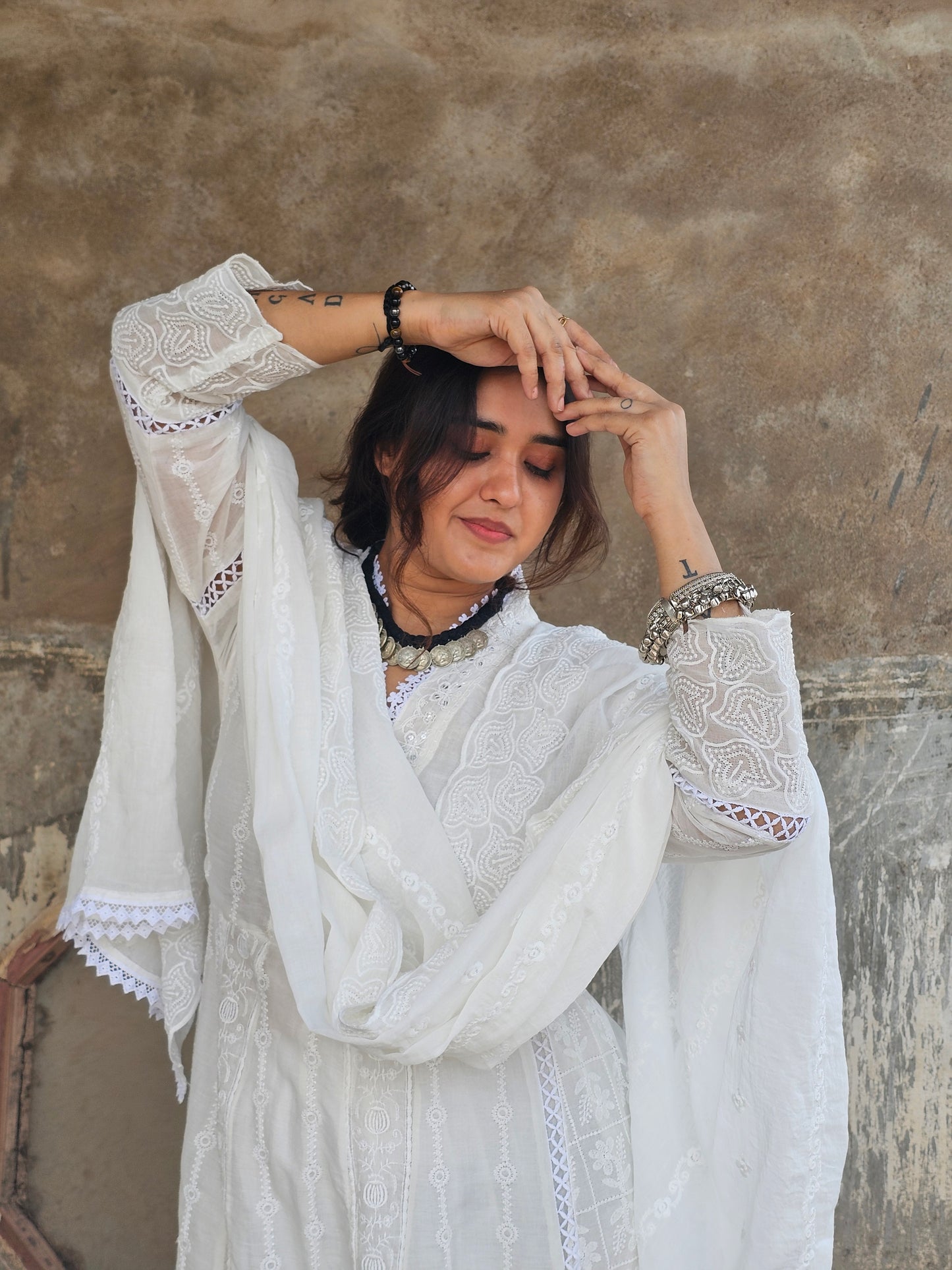 Jeenas white anarkali suit set