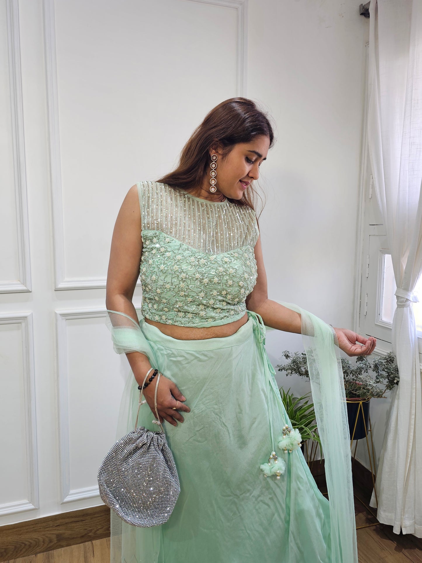 Jeenas party wear lehnga sea green