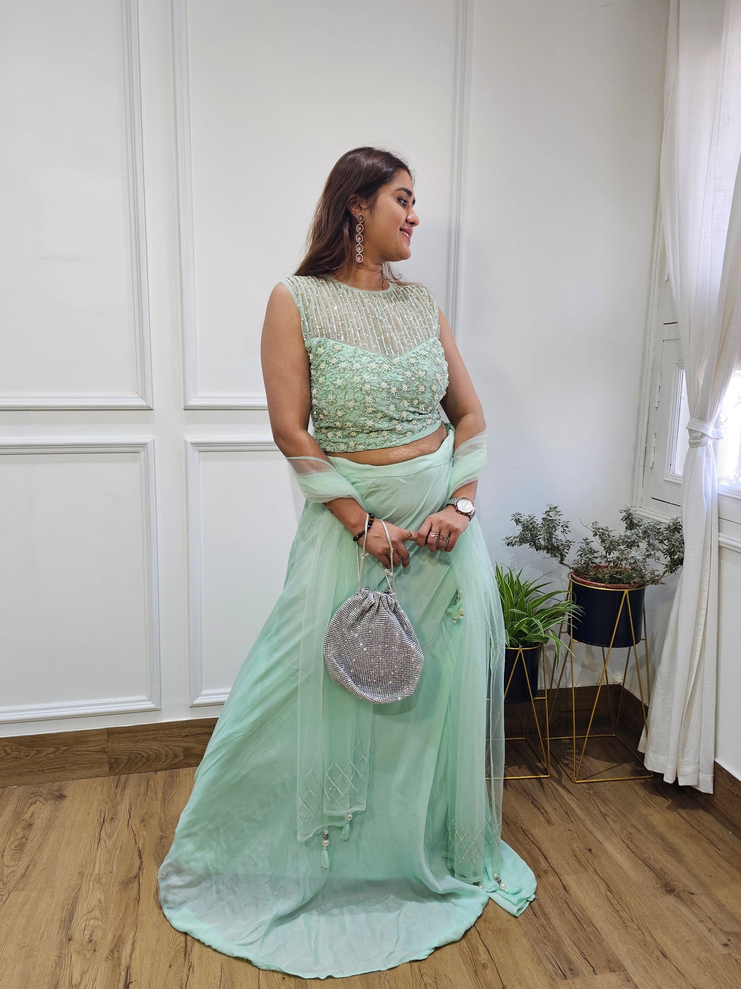 Jeenas party wear lehnga sea green