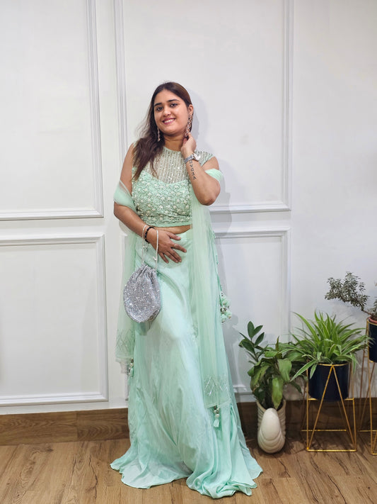 Jeenas party wear lehnga sea green