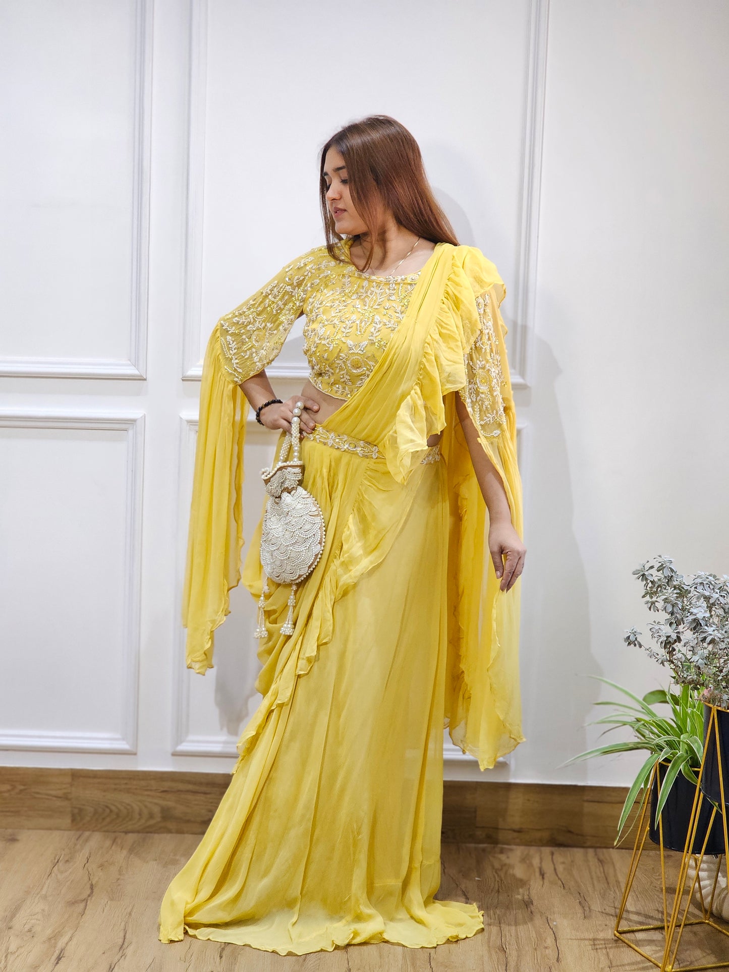 Jeenas yellow drape saree