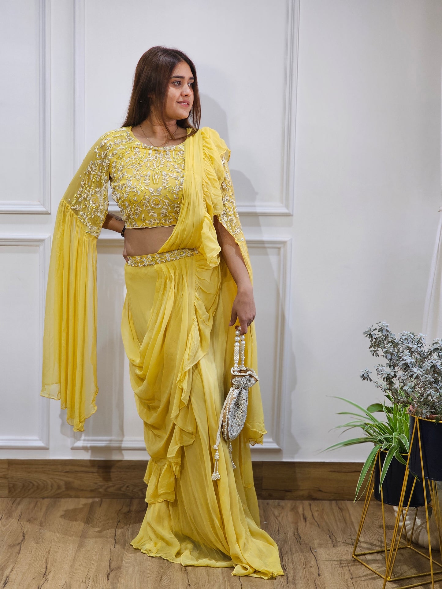 Jeenas yellow drape saree