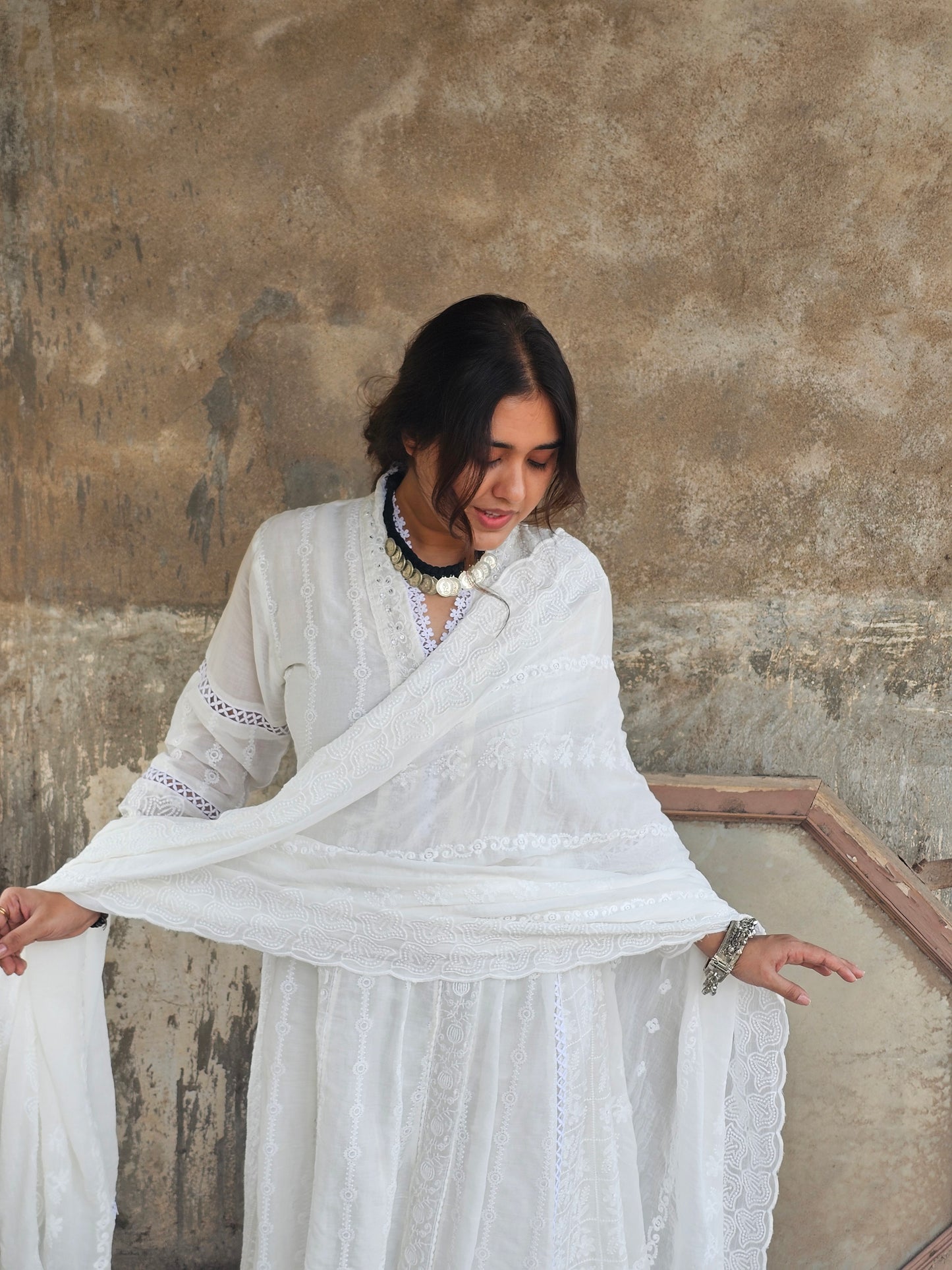 Jeenas white anarkali suit set