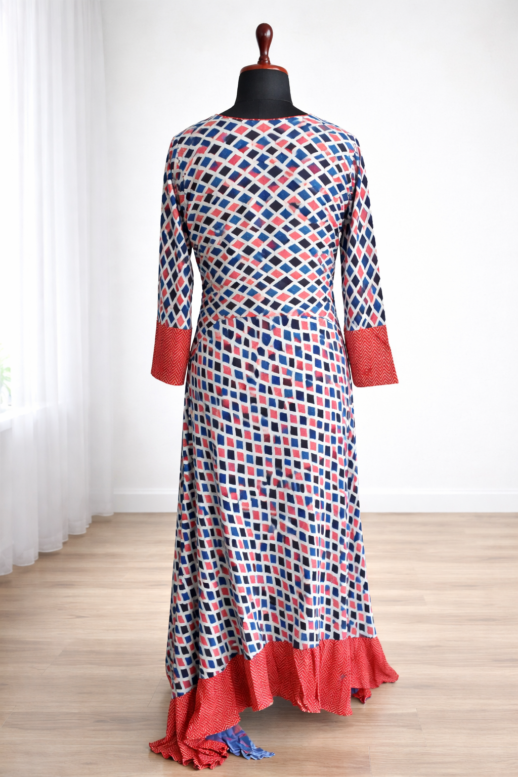 jeenas kurta featuring a colorful geometric diamond pattern