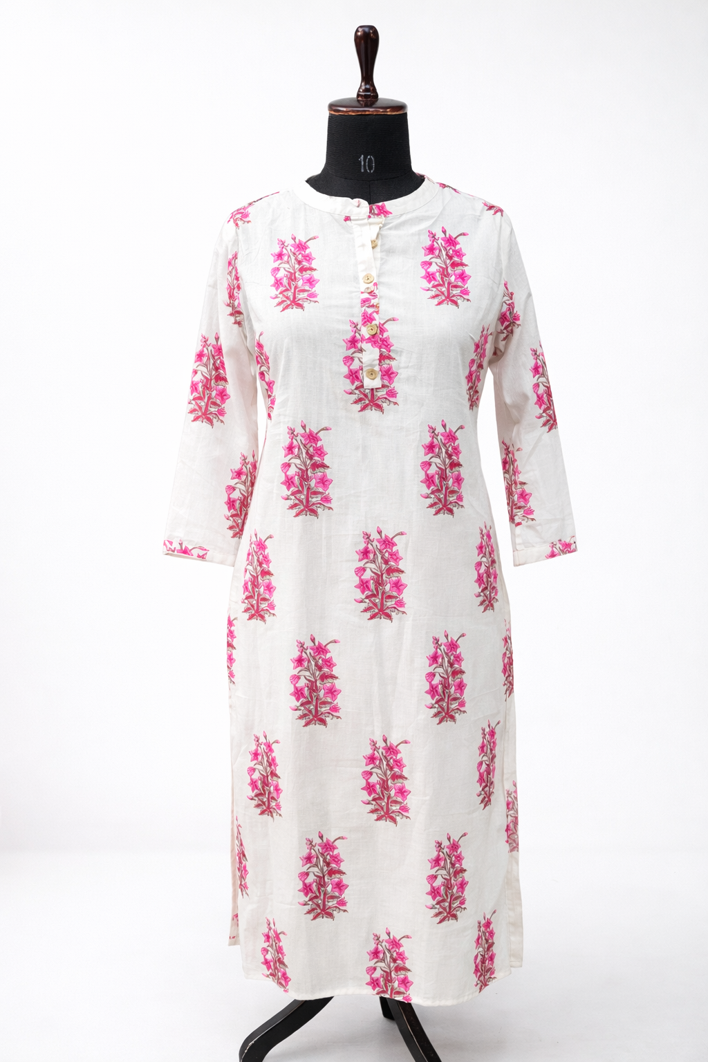 Jeenas white kurta with pink floral motifs